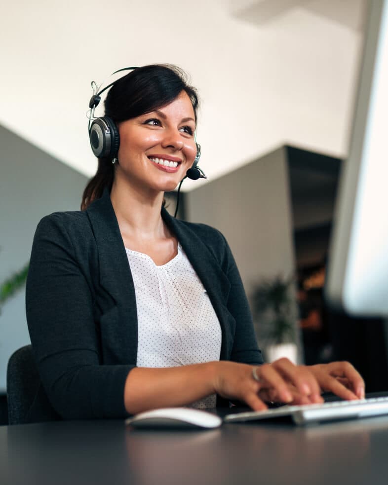 Customer care agent wearing a headset