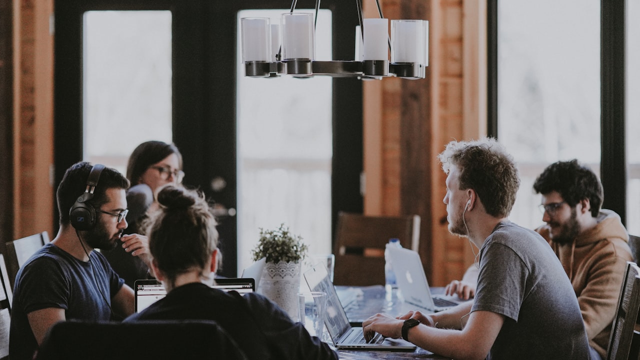Live chat agents handling concurrent customer conversations